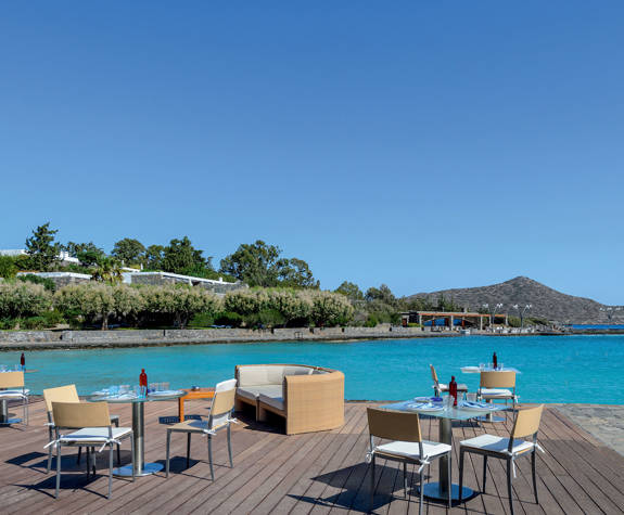 Elounda Bay Palace F Restaurant sitting area at the dock