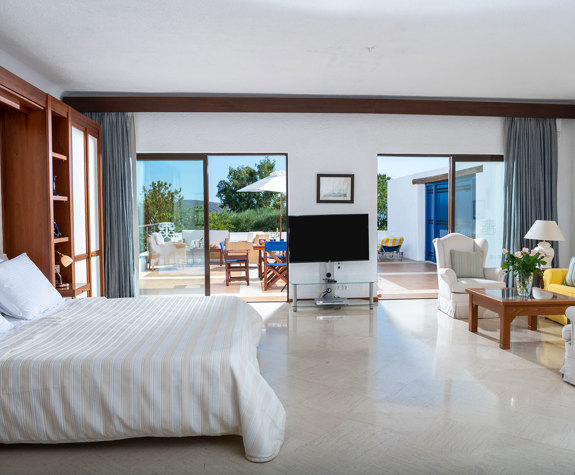 Elounda Bay Palace family suite garden view bedroom and sitting area