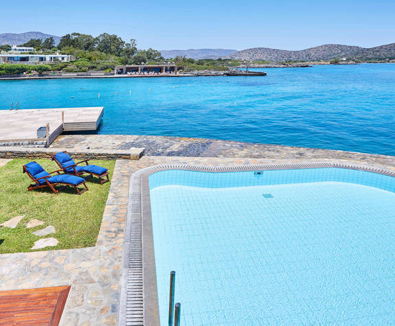 Elounda Bay Palace presidential suite private pool with sunbeds